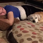 white dog sleeping with human